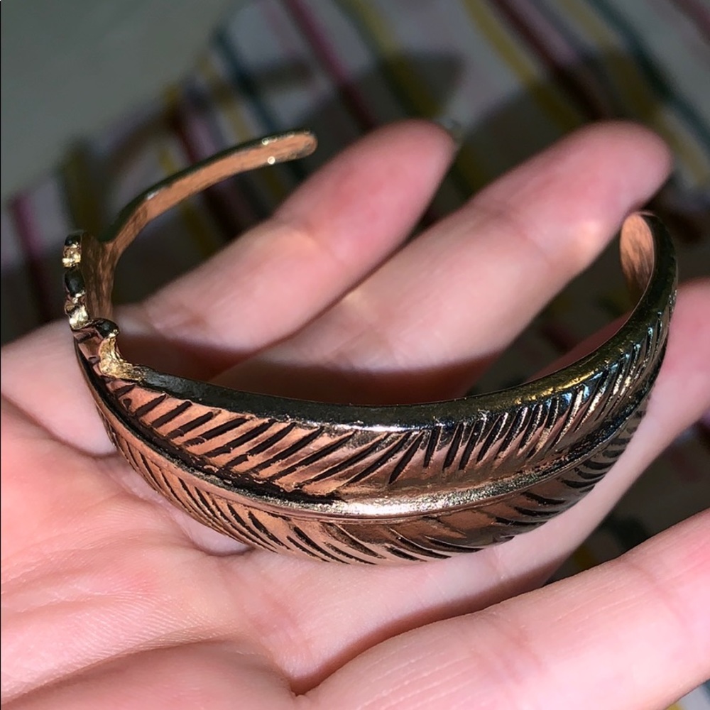 Gold feather bangle